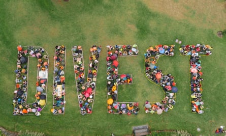 Hundreds of 350.org activists brave the rain in Melbourne, Australia ,to spell out their message loud and clear on Global Divestment day,  14 February 2015.