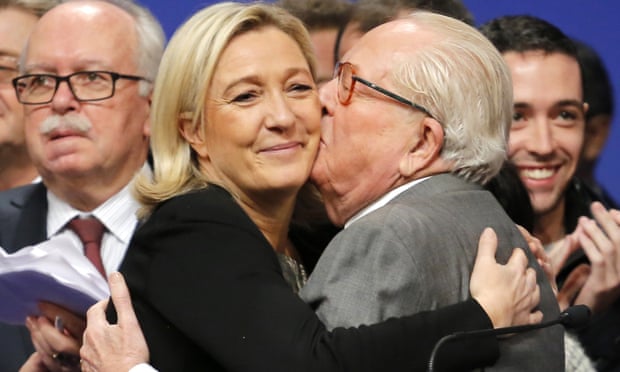 Front National leader Marine Le Pen is kissed by her father, Jean-Marie Le Pen