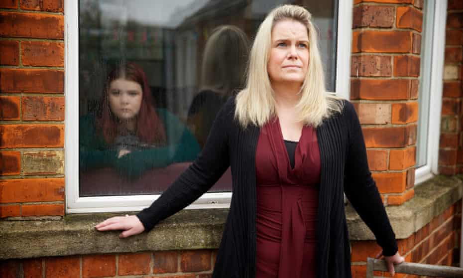 Sally Burke at home in Hull with her daughter Maisie, who has been forced to stay in a mental health hospital unit 100 miles away in Sheffield after her local facility was closed.