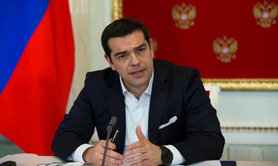 Greek prime minister Alexis Tsipras attends a joint news conference with Russian President Vladimir Putin.