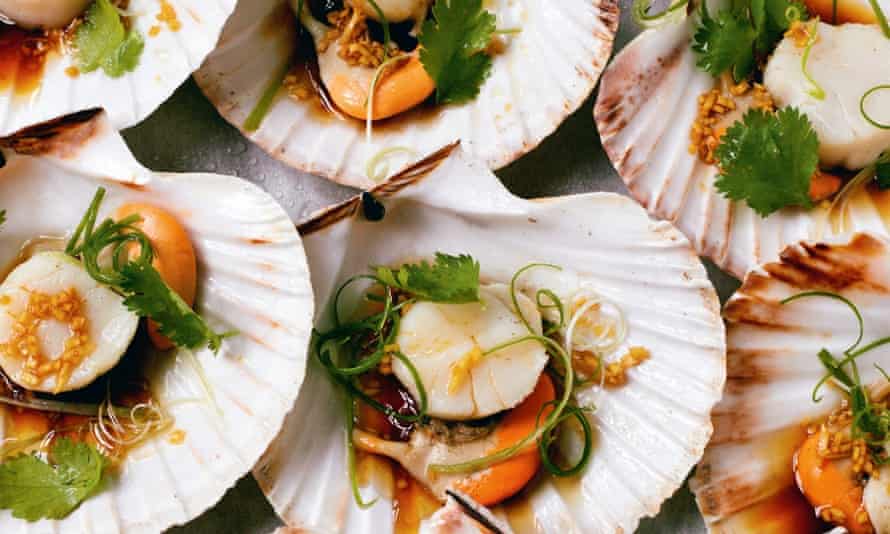 Steamed scallops in the shell with ginger, soy, sesame oil and spring onions.