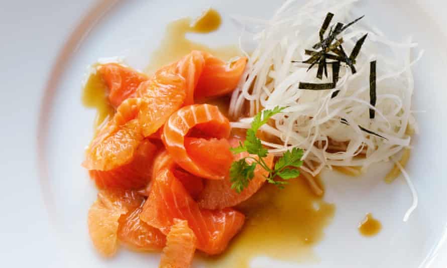 Sliced salmon with ponzu and pink grapefruit.