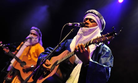 Tinariwen’s music originates from the Tuareg/Berber tribes of north Africa with its traditional nomadic, pastorialist lifestyle.