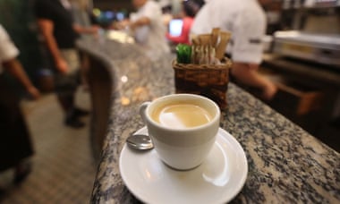 A cup of coffee made from Brazilian Arabica beans sits on the counter of a shop in Rio de Janeiro. Arabica beans account for 70% of the worldwide coffee market.