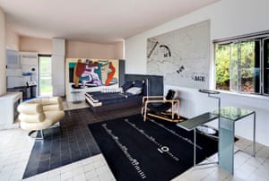 A view of the living room with furniture and rugs designed by Gray, and, on the far wall, Le Corbusier’s mural.