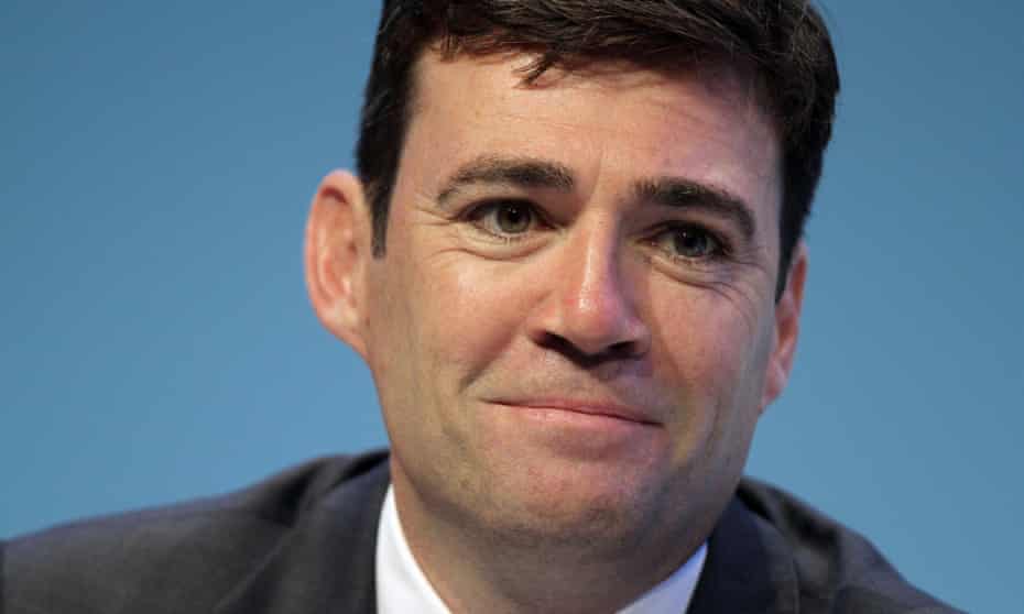 Shadow health secretary Andy Burnham indicated he may halt plans to devolve £6bn of NHS spending to Greater Manchester if Labour is in power after the general election.