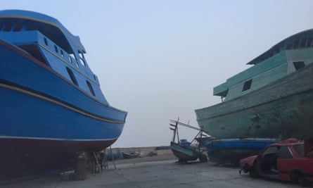 Boats awaiting maintenance in the fishing port of Zuwara