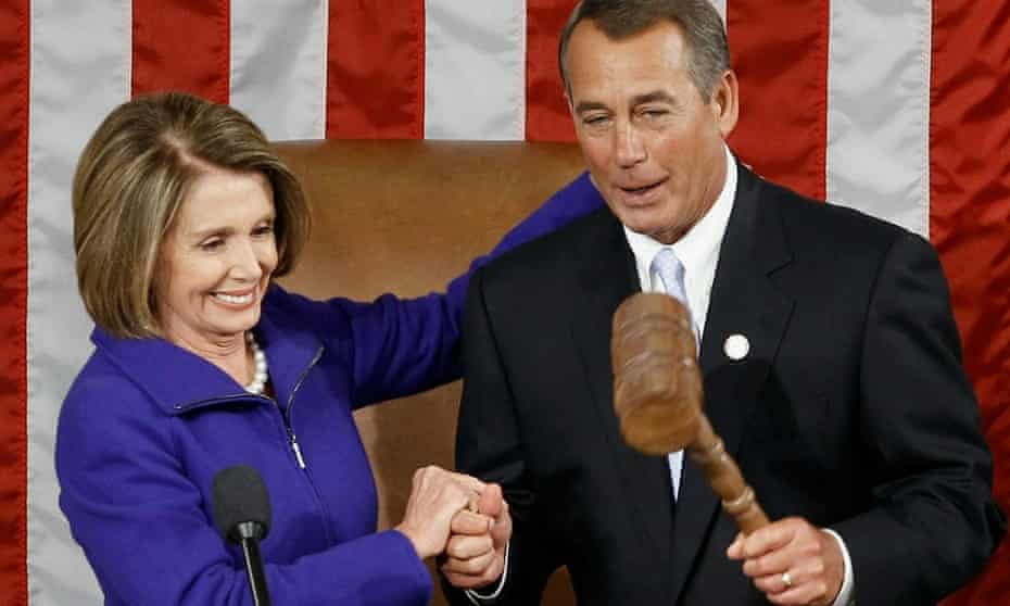 Republican John Boehner and Democrat Nancy Pelosi share a convivial moment in the US House.