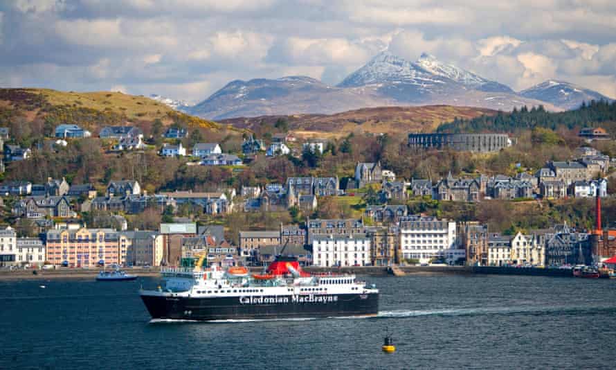 Caledonian MacBrayne ferry departs Oban with Ben Cruachan in view
