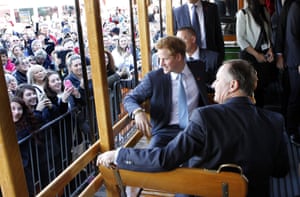 Christchurch, New Zealand Britain’s Prince Harry and New Zealand prime minister John Key ride on an old tram