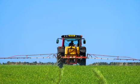 A farmer spraying crops near Thurstonland in Holme Valley, West Yorkshire.