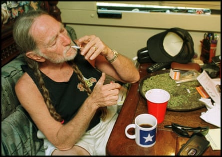 Willie Nelson smoking a joint