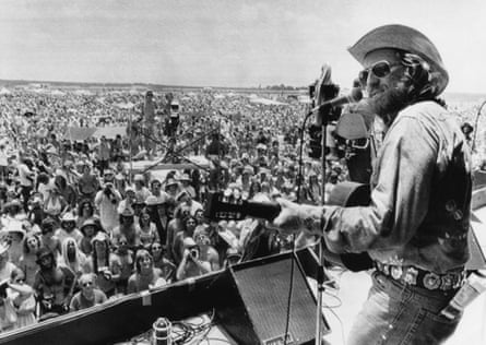 Willie Nelson playing at his annual 4 July Picnic festival in 1974 