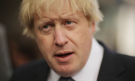 London Mayor Boris Johnson (C) is interviewed by ITN while campaigning with Simon Marcus, Conservative prospective parliamentary candidate for Hampstead and Kilburn, on May 1, 2015 in London, United Kingdom.