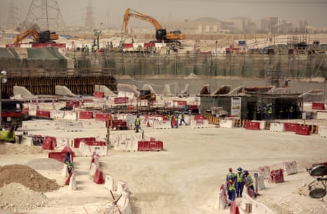 Labourers building al-Wakra stadium.