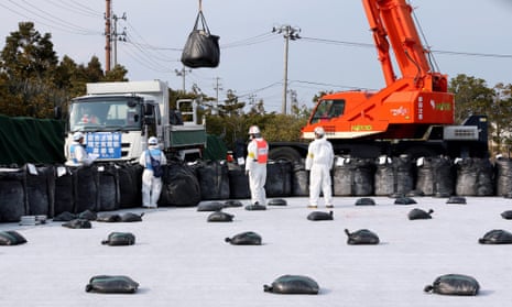 Radioactive soil and debris is arranged for storage in Fukushima, Japan.