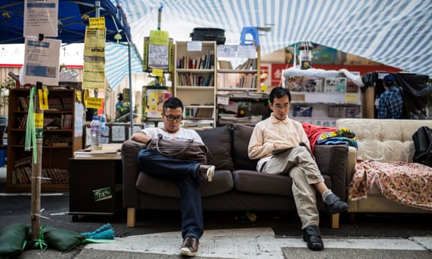 People read at a road library set up by pro-democracy protesters in the Mongkok district of Hong Kong in November 2014.