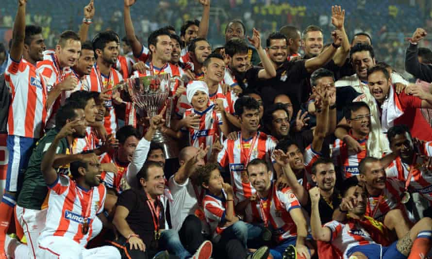 Atlético de Kolkata players celebrate after winning the Indian Super League title in Mumbai in December last year.
