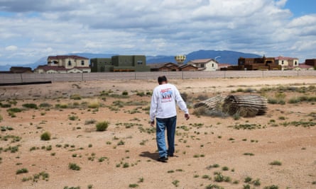 Mesa del Sol resident Dean Savas tours the desolate land he says is supposed to be a park.