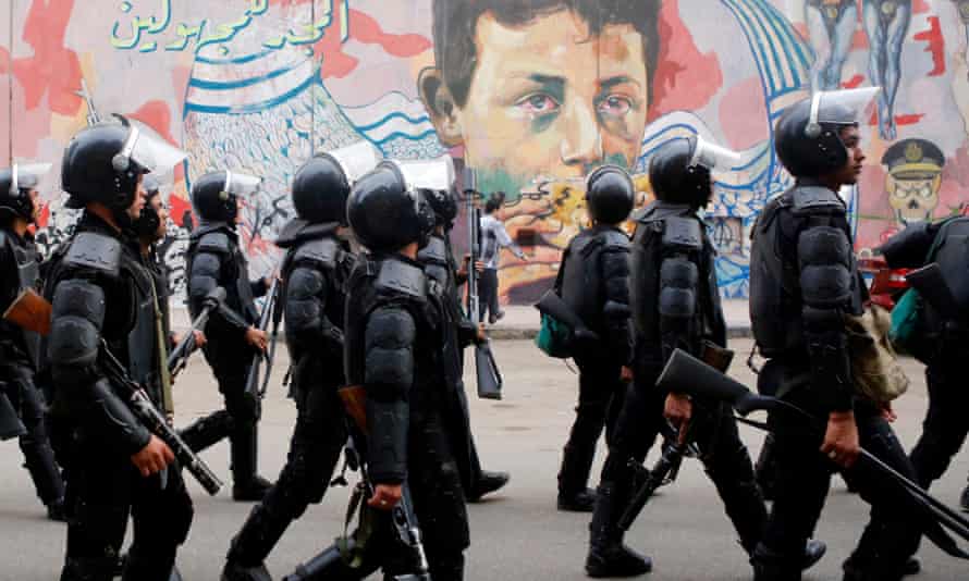 Egypt's riot police head to Tahrir Square in Cairo in November 2014.