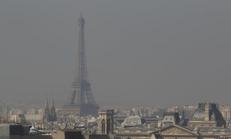 A view of the Eiffel Tower and the city surrounded by high levels of air pollution on March 23, 2015 in Paris, France. Paris authorities have introduced emergency measures to help control pollution levels, such as alternate driving days in Paris, limiting cars to 20 kilometers per hour and vehicles with number plates ending in an even number will be banned from the roads of Paris and surrounding suburbs.