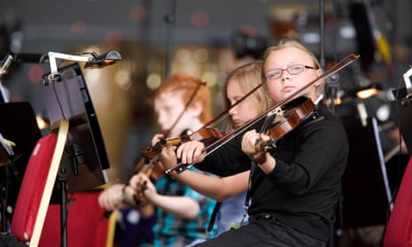 Children from the Raploch housing scheme rehearse for an outdoor concert with Gustavo Dudamel and The Simon Bolivar Symphony Orchestra of Venezuela in Stirling, June 2012.