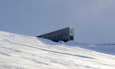 In daylight, the concrete portal seed vault looks a bit like an iceberg jutting out of the snow.