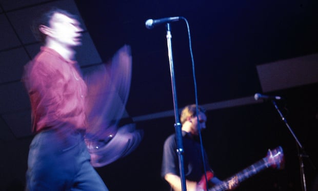 Blurred lines … Ian Curtis and Peter Hook on stage with Joy Division.