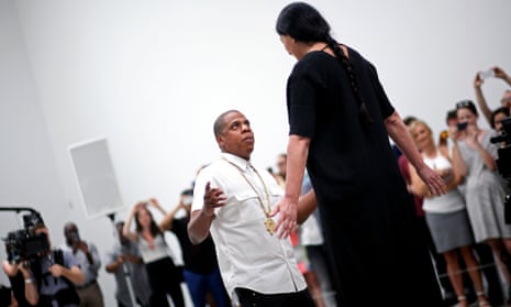 Jay Z dances with the Marina Abramovic at the Pace Gallery.