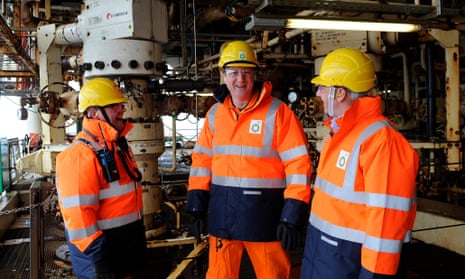 Prime Minister David Cameron (centre) with BP regional president (North Sea) Trevor Garlick (right) and offshore installation manager Mark Furness, 
