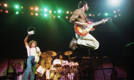 1976, San Francisco, California, USA --- Pete Townshend jumps as he plays guitar with The Who in concert