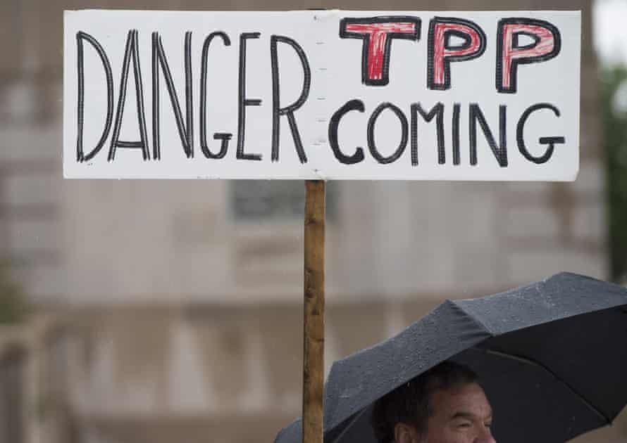 Demonstrators march in Washington DC to protest against the Trans-Pacific Partnership.