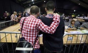 A couple watch the count at a count centre in Dublin