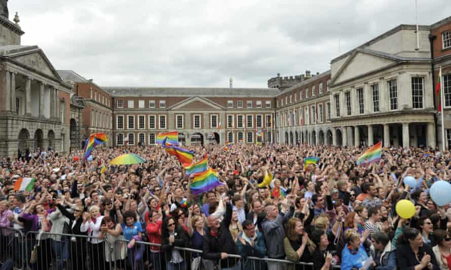 Crowds celebrate the landslide yes victory at Dublin castle.