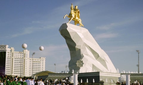 People gather in Ashgabat, Turkmenistan, on Monday for the inauguration of a monument to President Gurbanguly Berdymukhamedov