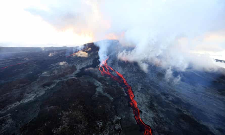 Lava flows out of the Piton de la Fournaise volcano as it erupts on May 17, 2015 on the French island of La Reunion in the Indian Ocean. The Piton de la Fournaise started to erupt early on May 17, with its last eruption dating back to February 4. AFP PHOTO / RICHARD BOUHETRICHARD BOUHET/AFP/Getty Images