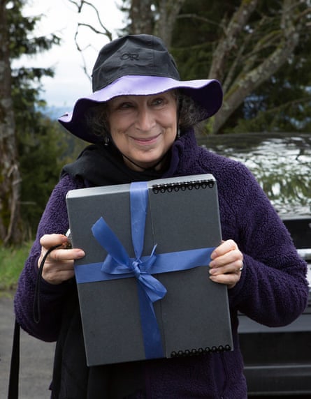 Margaret Atwood holding the manuscript for Scribbler Moon, for Future Library