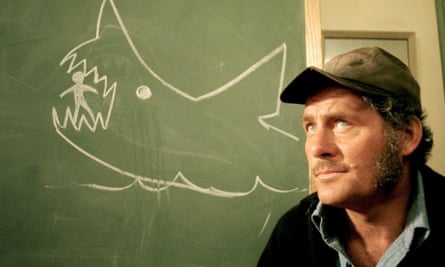 Robert Shaw as Quint, the fisherman who agrees to hunt down the shark, in Jaws.