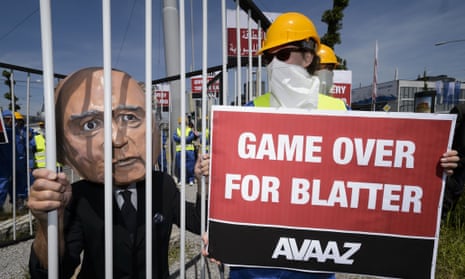 A demonstrator wearing a Sepp Blatter mask takes part in a protest against the condition of workers in Qatar, on the sidelines of the 65th Fifa Congress on May 28, 2015 in Zurich.