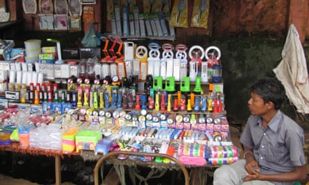 Roadside vendor selling battery torches