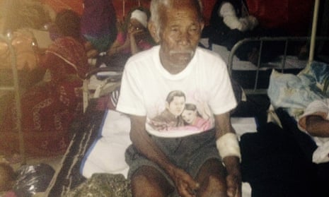 Funchu Tamang, 101, sits on a bed in a hospital after being pulled alive from the rubble left by the Nepali earthquake.