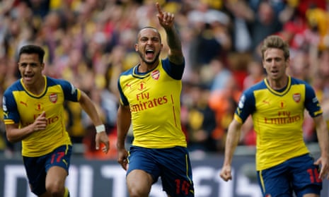 Theo Walcott and Arsenal celebrate going 1-0 ahead in the FA Cup final against Aston Villa.