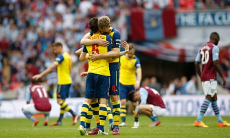 Arsenal's Per Mertesacker and Laurent Koscielny celebrate at the full time whistle ...