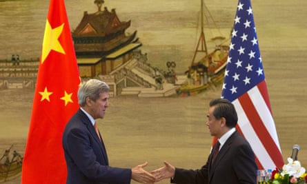 An uneasy relationship? US secretary of state John Kerry, left, and Chinese foreign minister Wang Yi shake hands after a press conference following meetings at the Ministry of Foreign Affairs in Beijing.