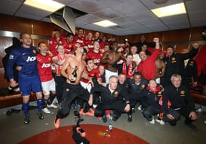 2012-13 The Manchester United squad celebrate in the dressing room after the match against Aston Villa at Old Trafford. The 3-0 victory gave them their 20th League title.