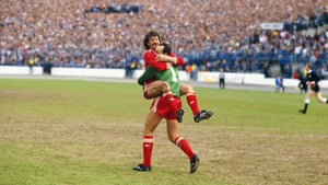 1985-86 Liverpool defender Mark Lawrenson celebrates with goalkeeper Bruce Grobbelaar after their 1-0 win over Chelsea at Stamford Bridge meant Liverpool pipped Merseyside rivals Everton to the title.  A week later Everton lost out again to their neighbours when when Liverpool beat them 3-1 in the FA Cup final to win the double