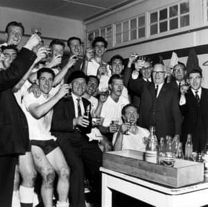 1960-61 After a 2-1 win over Sheffield Wednesday, th Spurs players celebrate with champagne in the White Hart Lane dressing room after winning their second League title, manager Bill Nicholson is seated in the middle of the group wearing the Chairman's bowler hat. Three weeks later Spurs beat Leicester City 2-0 in the FA Cup Final to complete an historic double - the first side to achieve such a feat