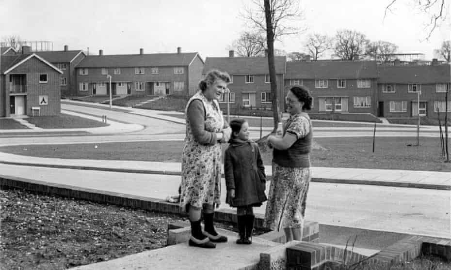 Two women and a child the garden of a council house in the new town of Hemel Hempstead, Hertfordshir