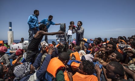 Migrants wooden boat Sicily