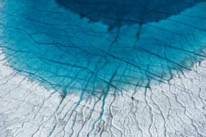 Greenland Meltwater flows into an unnamed seasonal lake atop the Greenlandic ice sheet  about 100km southeast of Ilulissat.